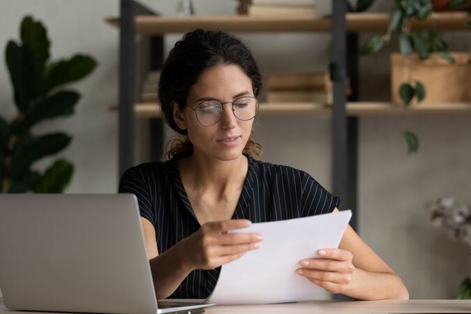 Woman reading a contract